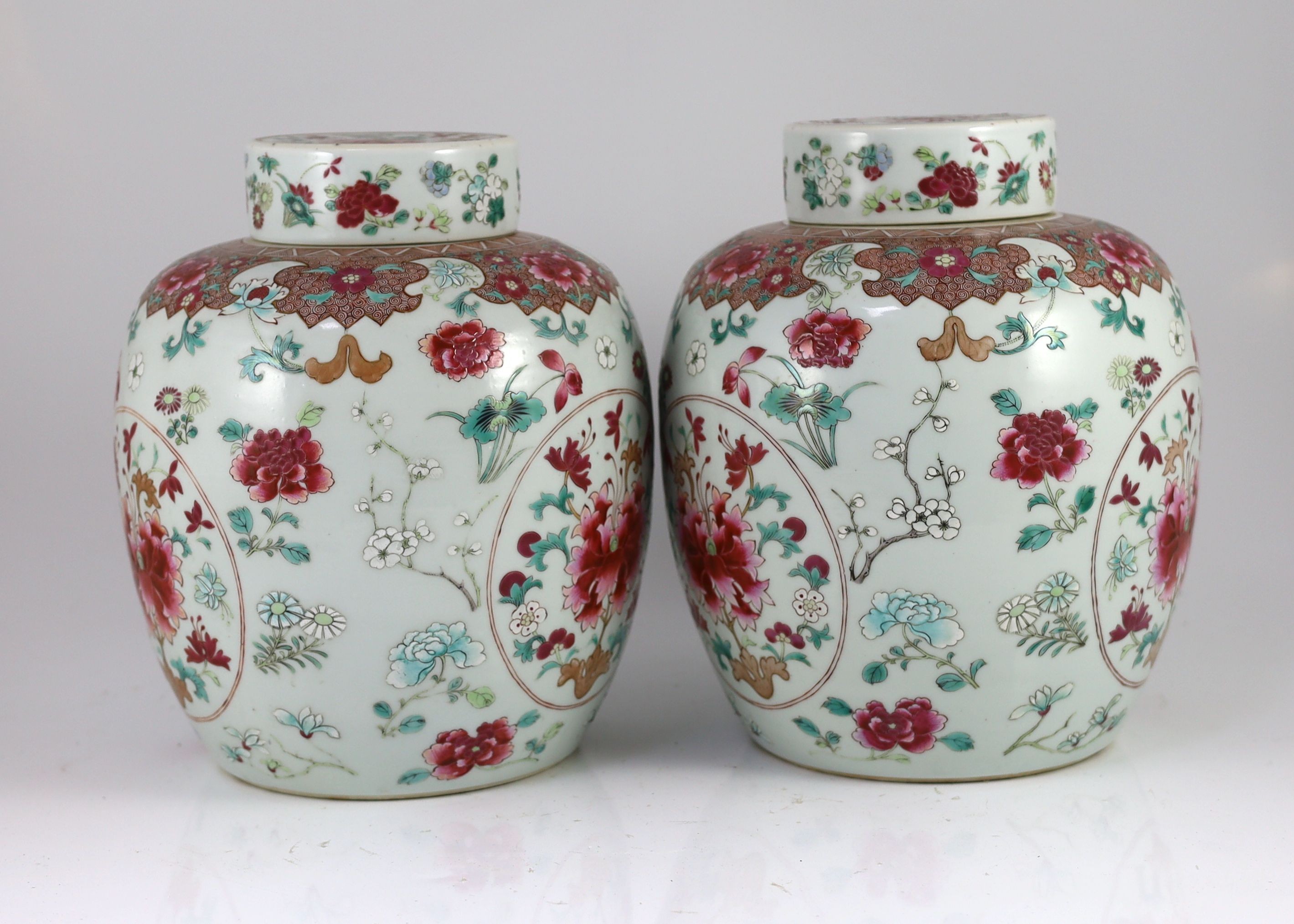 A good pair of Chinese famille rose ovoid jars and covers, 19th century, 28.5 cm high